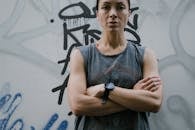 Boy in Gray Tank Top Wearing Black Watch