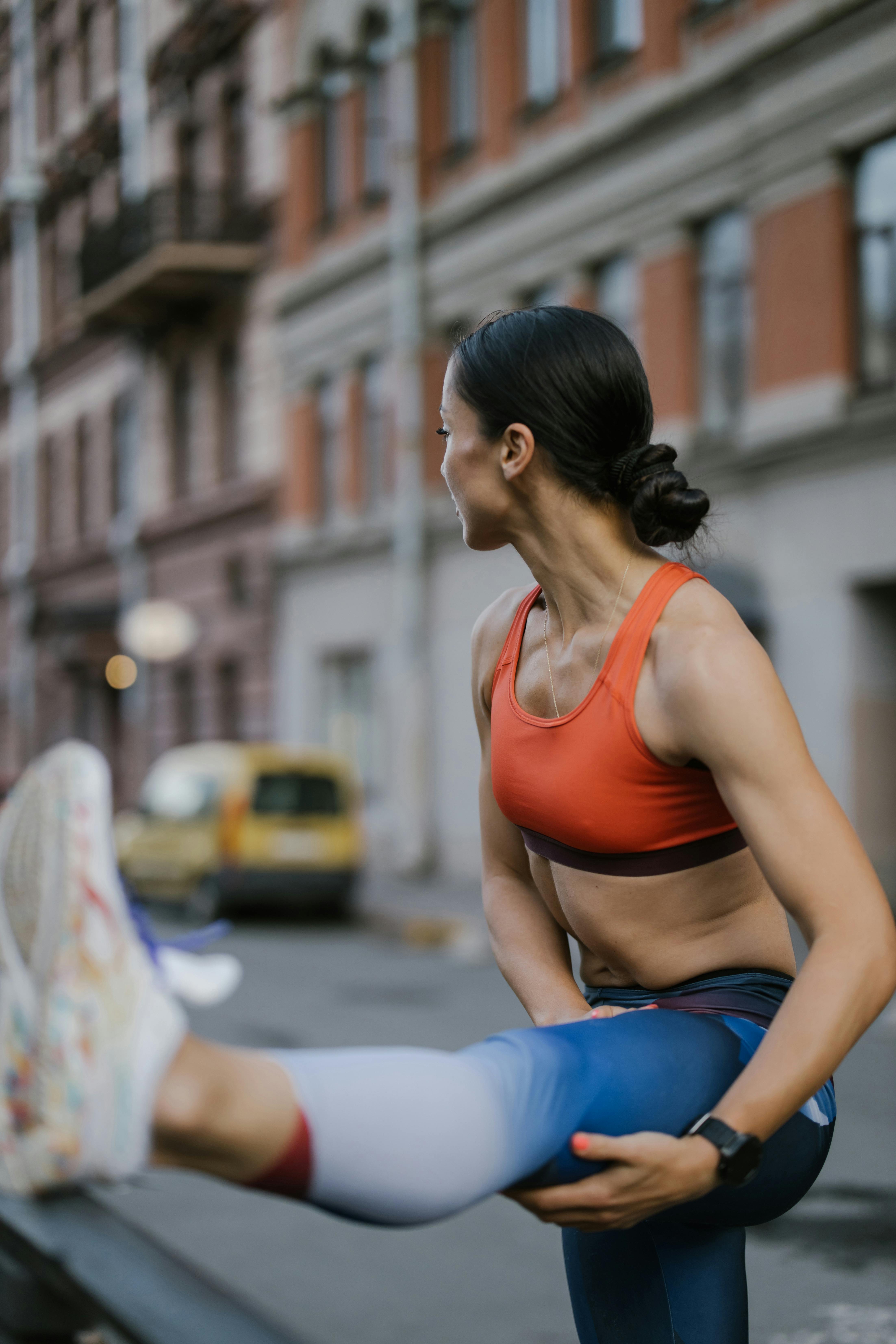 Woman Is Stretching Her Long Legs On The Fitness And Circuit Training Stock  Photo - Download Image Now - iStock