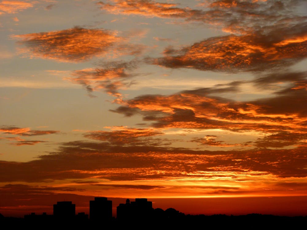 Gratis Cielo Arancione Durante L'alba Foto a disposizione