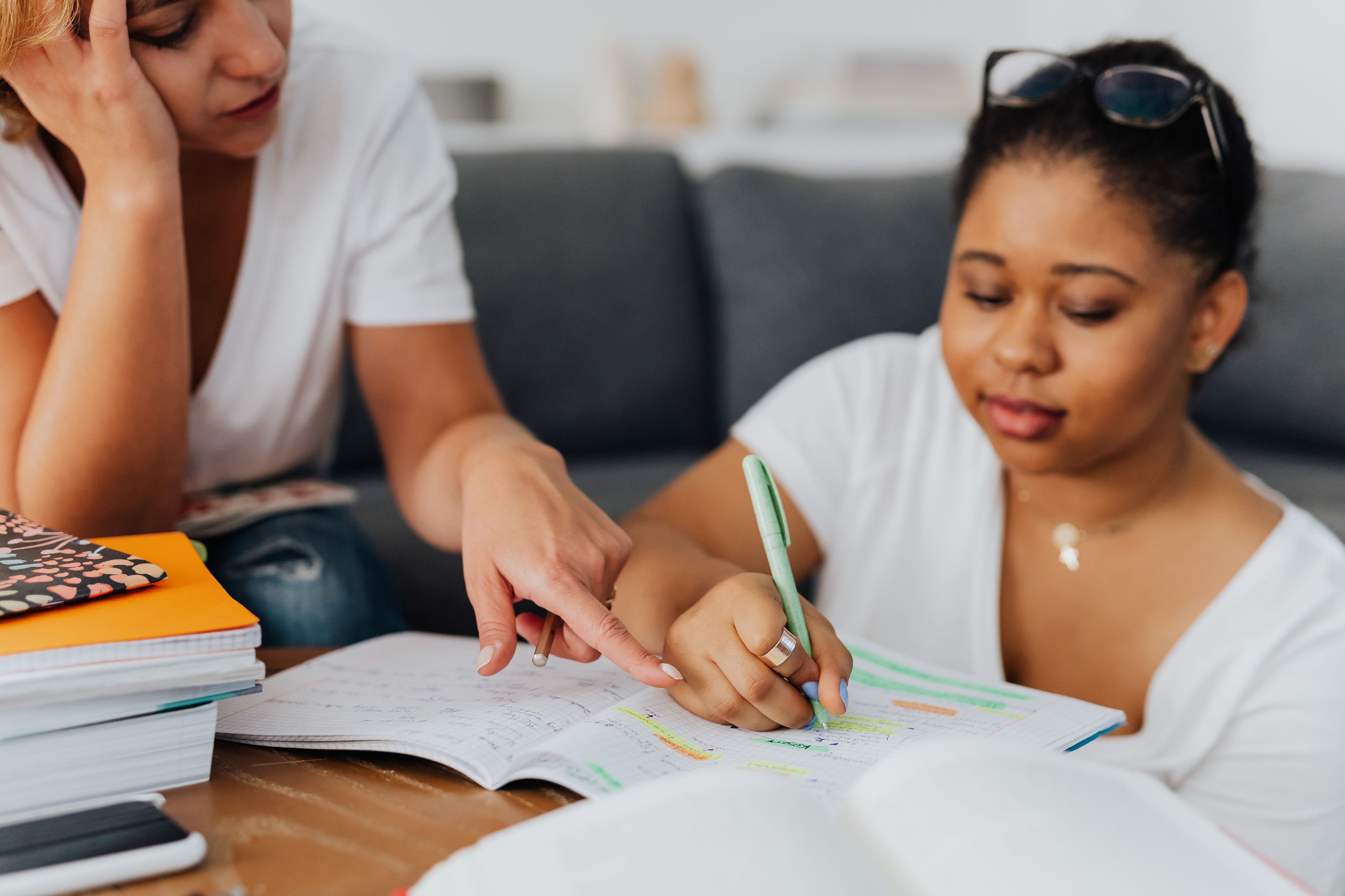A tutor working through a question with a student