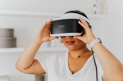 Free Woman Playing a Virtual Reality Game
 Stock Photo