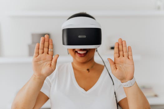 Happy woman interacting with virtual reality using VR headset indoors.