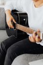 Person Playing Guitar