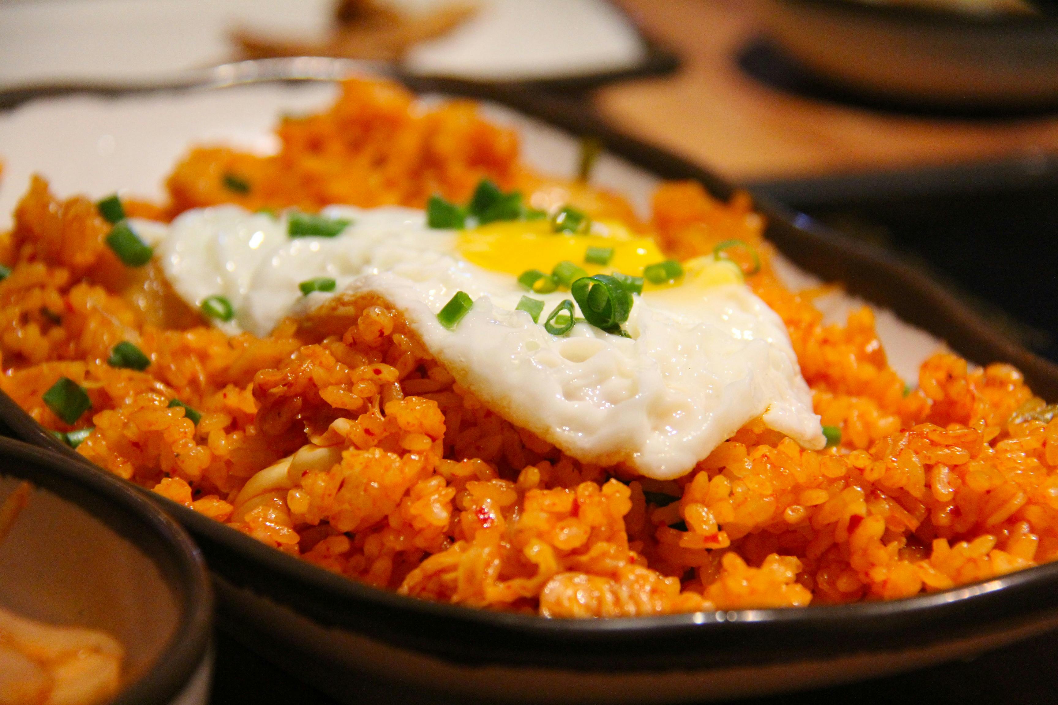 White and Yellow Sunny Side Up Egg on Fried Rice