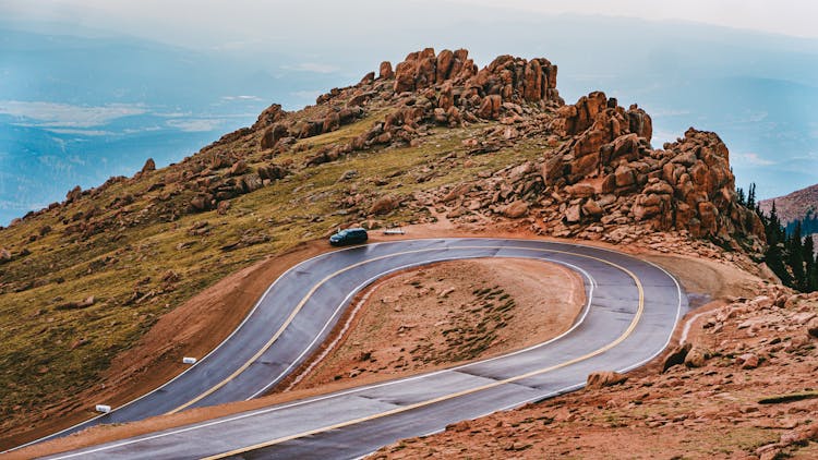 Road With U-Turn In Mountains