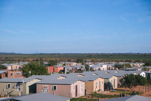 Aerial Photography of a Small Town Under Blue Sky