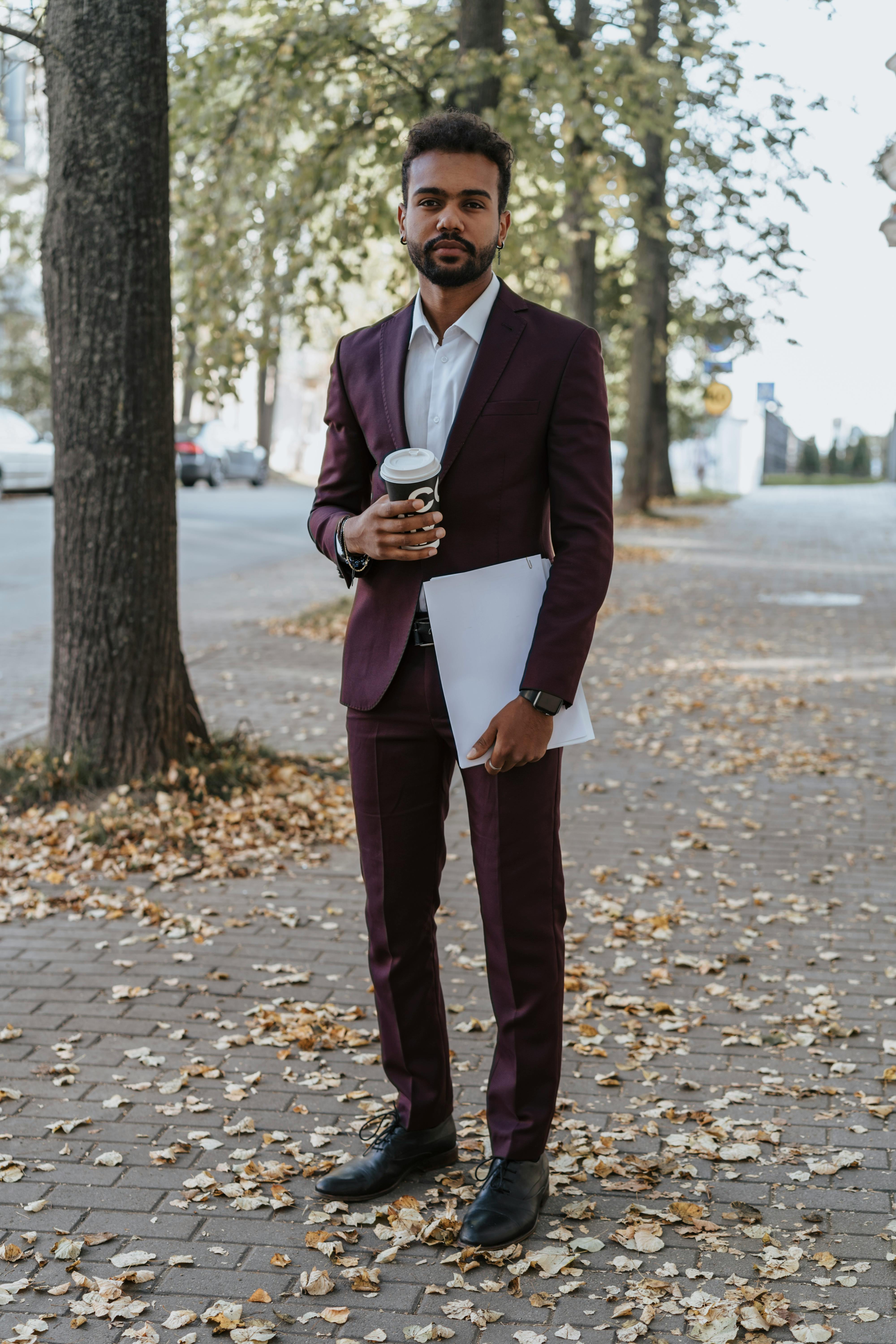 Man in Black Suit Standing on Pathway · Free Stock Photo