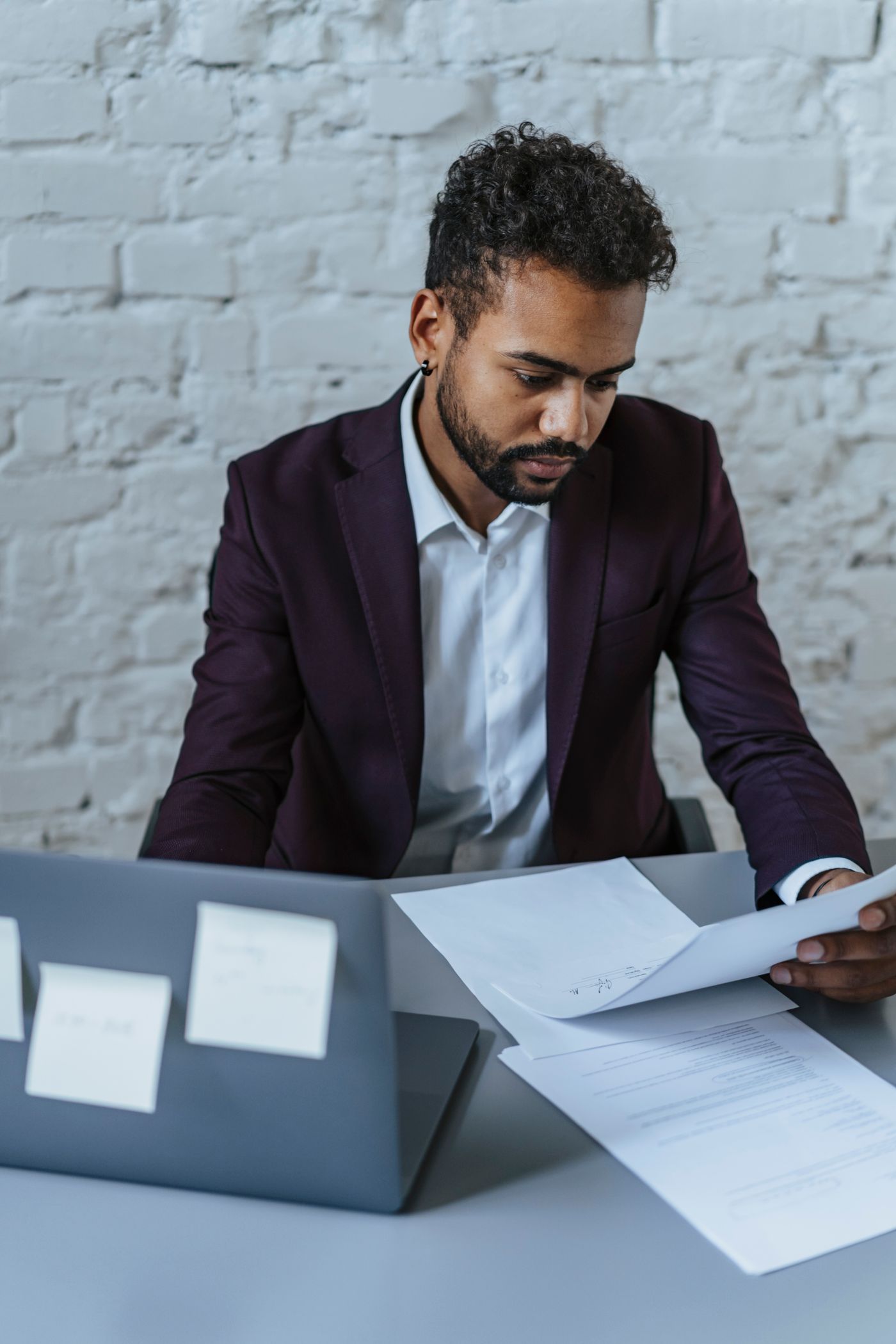 A legal professional reviewing contracts in a South African law firm