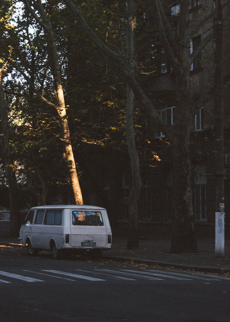 Old Van Parked On The Side Of The Road