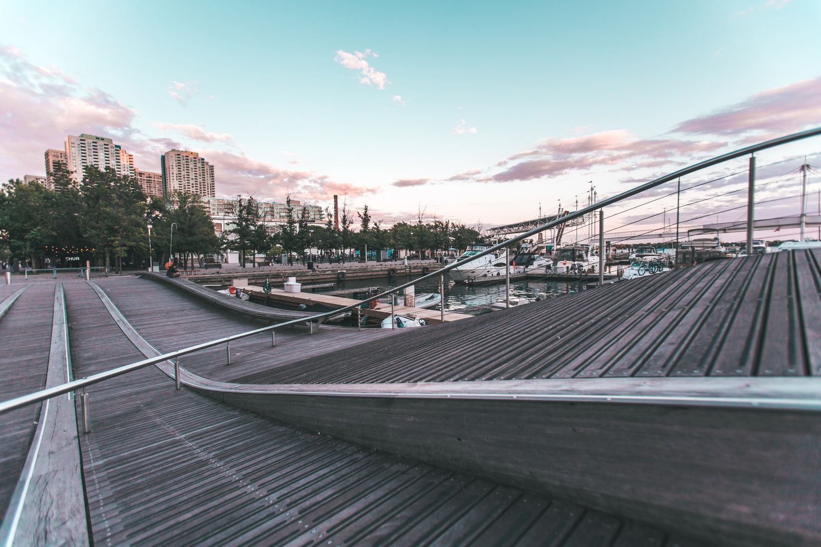 The promenade faces the harbor and tends to be at its best in the hour before sunset.
