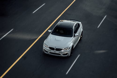 Free White BMW Car on Road Stock Photo