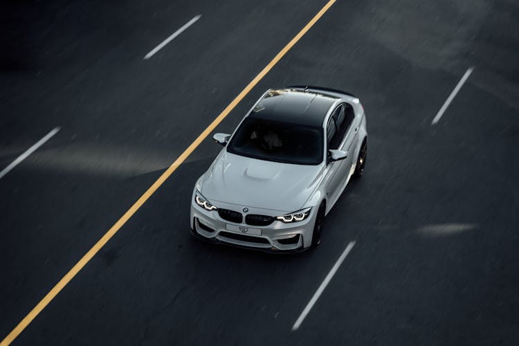 White BMW Car On Road