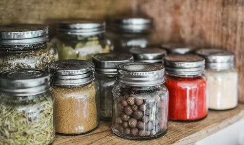 Free Spice Bottles on Shelf Stock Photo