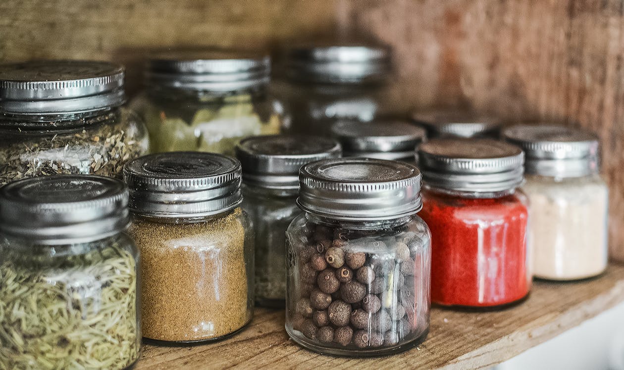 stored herbs in jars