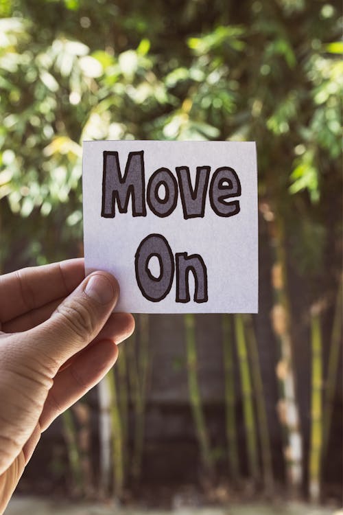 Free Move On Message on a Paper Stock Photo
