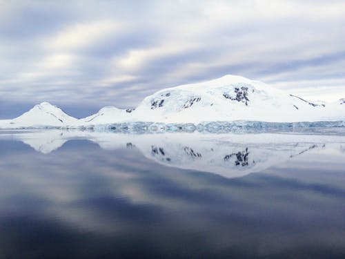 Snow Covered Hills Near the Sea