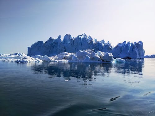 Free Iceberg in the Calm Ocean Stock Photo