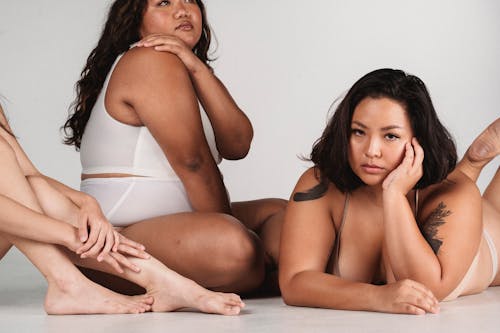 Asian plus size female models in underwear in studio