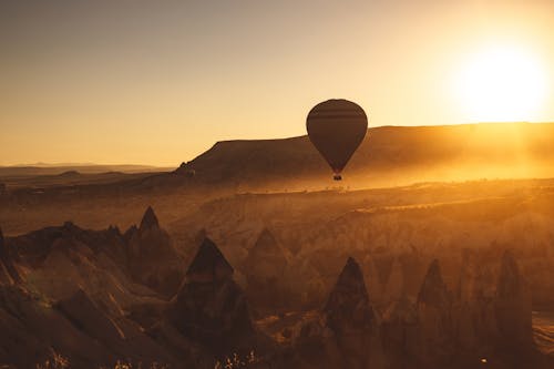 Free A Hot Air Balloon in the Sky During Sunset Stock Photo
