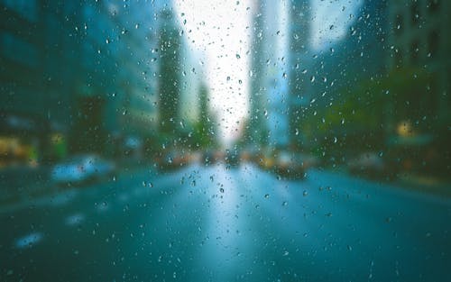 Free View of Street from a Glass Window Stock Photo