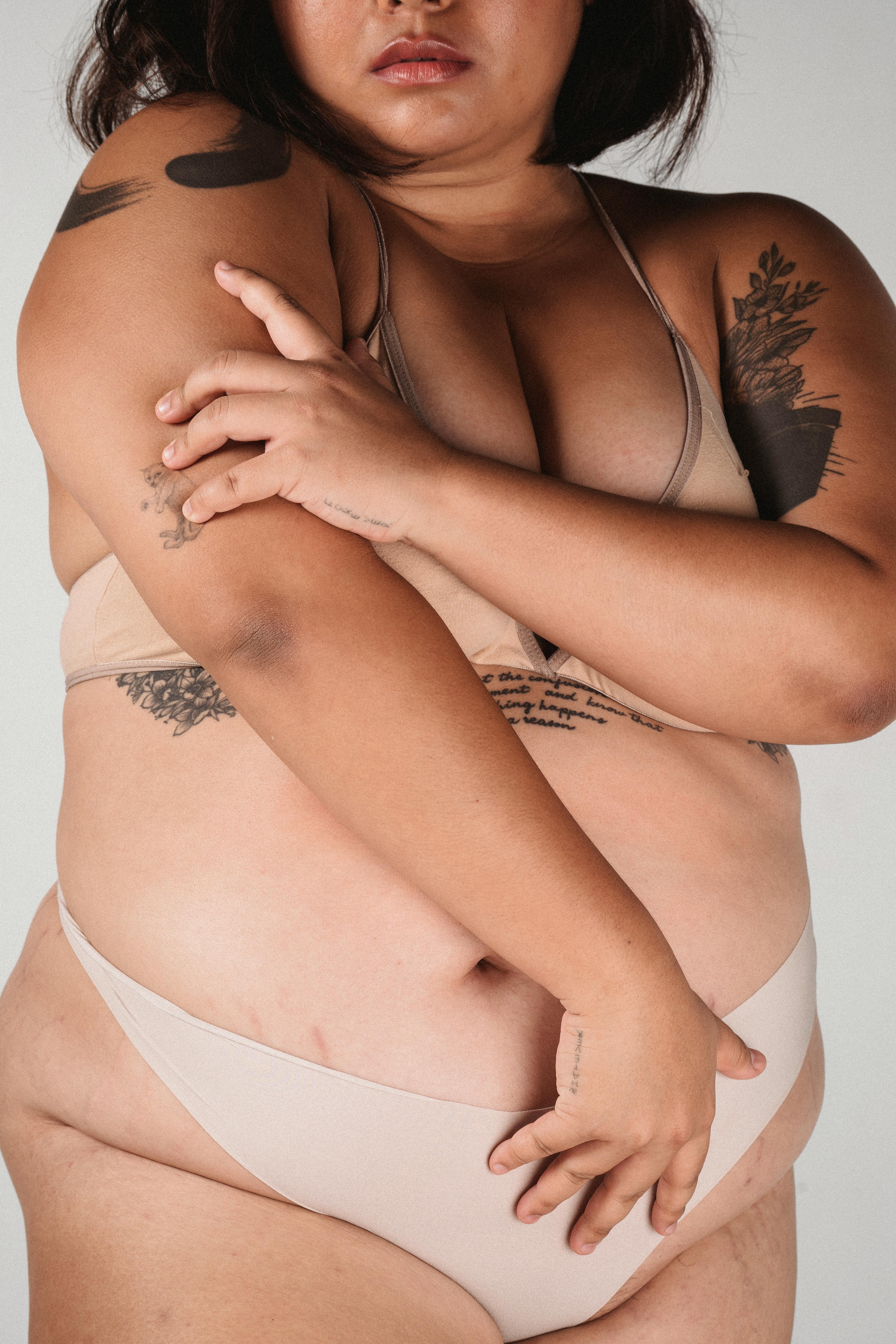 Sensual ethnic naked plus size female covering body Â· Free Stock Photo