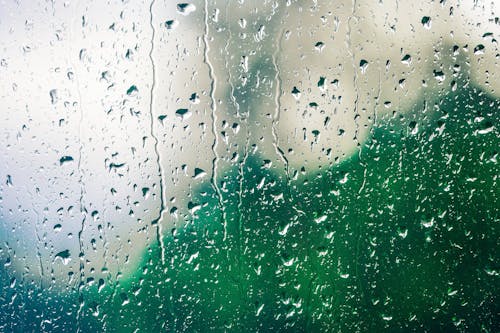 Glass Panel Covered With Sprinkle of Water