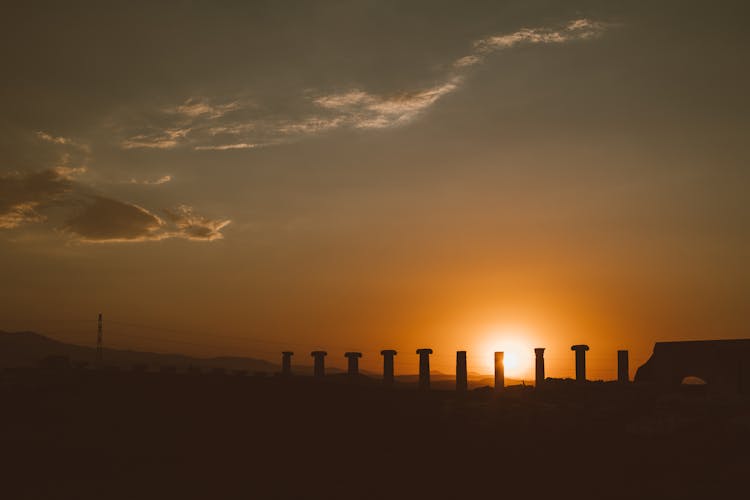 Silhouette Of Pillars During Sunset