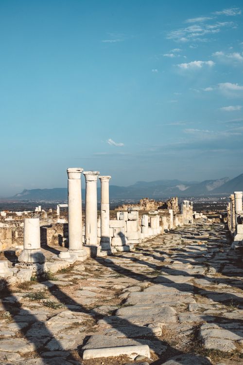 Free Explore the ancient ruins of Laodicea with its iconic columns under a clear blue sky, perfect for travel enthusiasts. Stock Photo