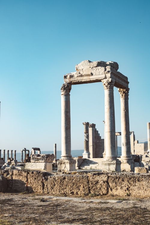 Free Explore the stunning ancient ruins of Laodicea with iconic columns and clear blue sky. Stock Photo