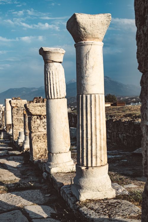 Free Explore the ancient ruins of Laodicea, featuring majestic columns under a clear blue sky in Turkey. Stock Photo