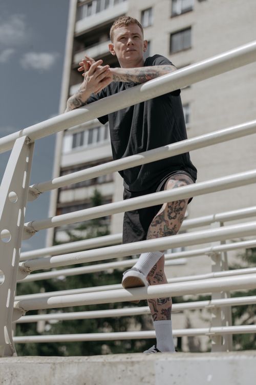 Guy Railing A Man Standing Near the Railings · Free Stock Photo