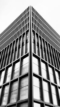 Black and white perspective of a modern building in Amsterdam, Netherlands.