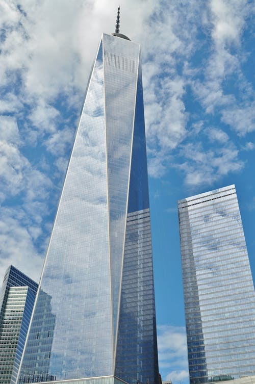 Curtain Wall Buildings Under Blue Cloudy Sky