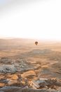Yellow and Red Hot Air Balloon over Water