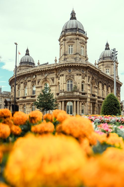 Free Explore the historic baroque architecture of Hull Maritime Museum in Kingston upon Hull, England, with vibrant gardens. Stock Photo