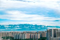 Cityscape With Mountains In Background
