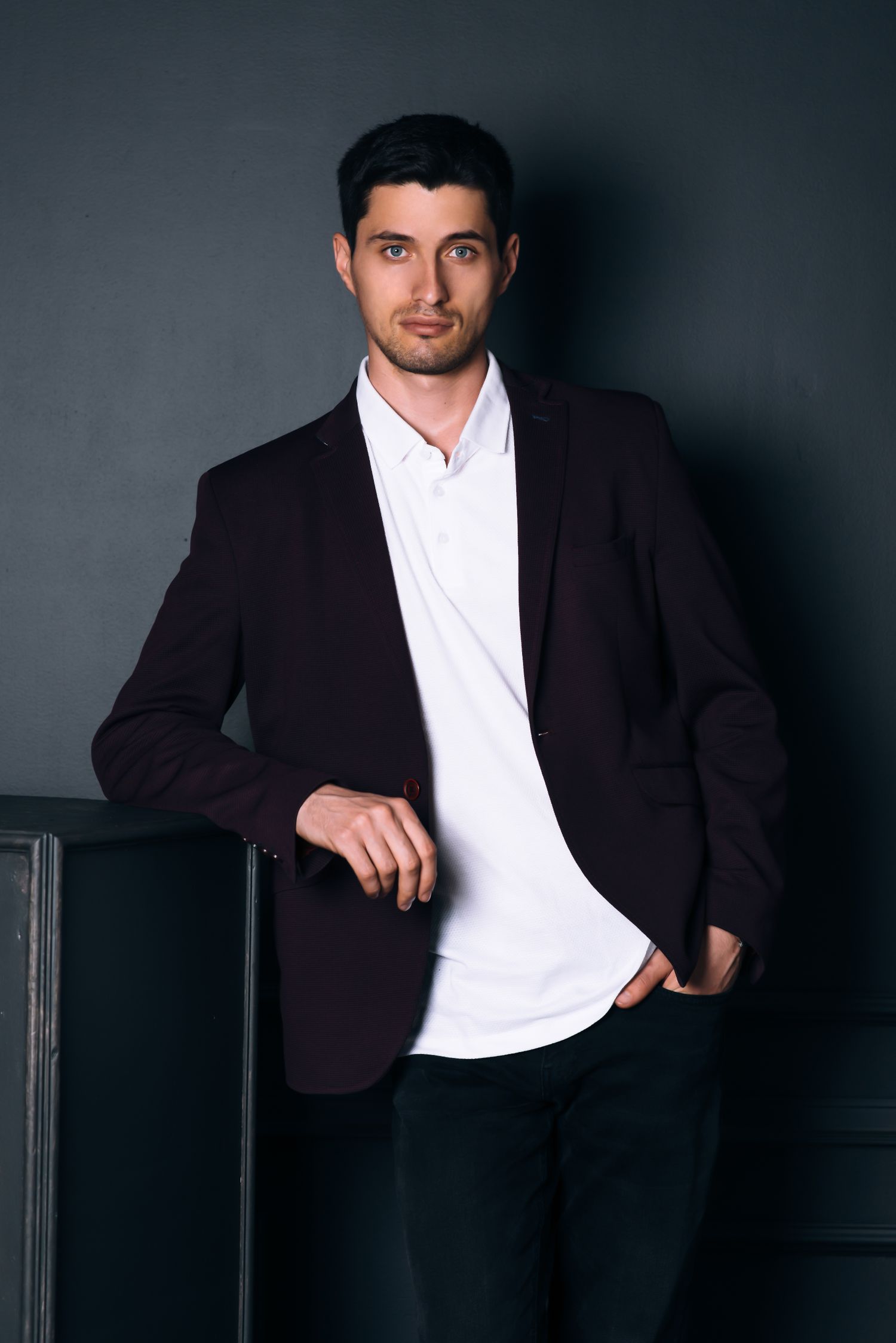 Male model wearing tailored menswear with a clean fit