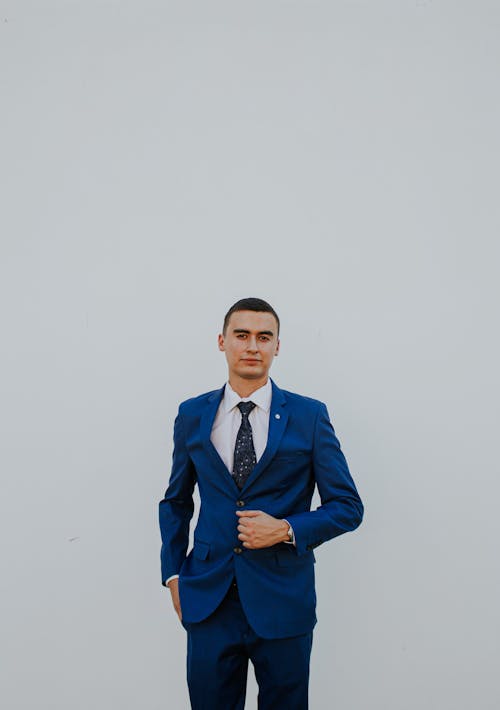 Free A Man Posing in the Blue Suit Stock Photo