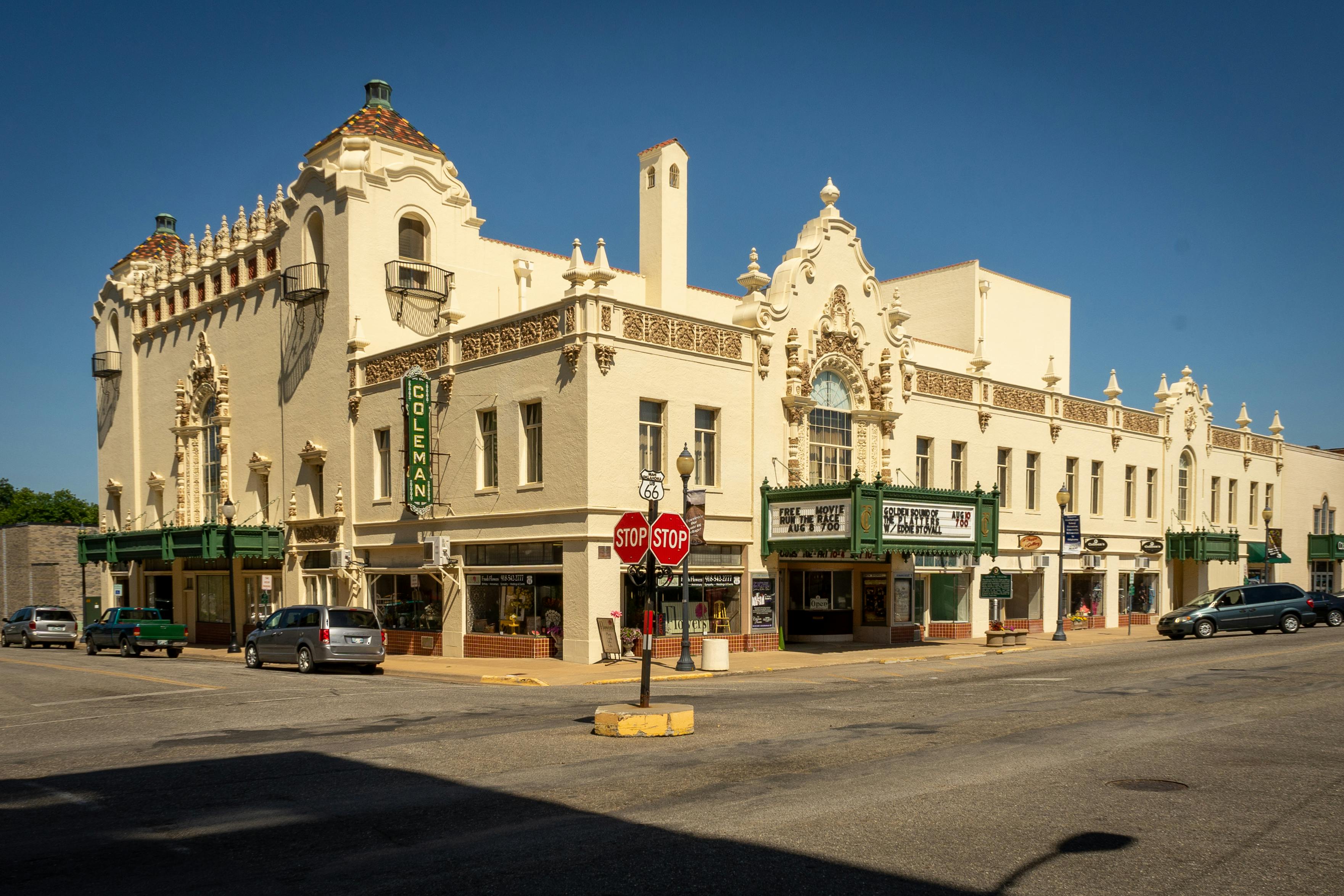 Free The ornate architecture of the Coleman Theatre on Route 66 under a clear blue sky. Stock Photo