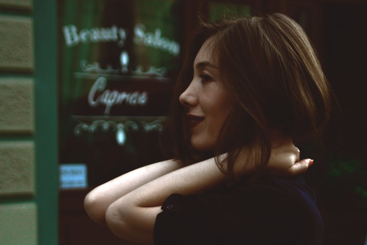 Wide interior view of a grand historic basilica in Rome with arches and soft light