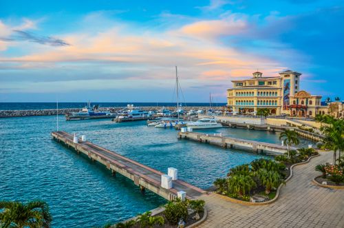 Free Aerial view of Ocean World Marina in Puerto Plata with boats docked near a luxury resort Stock Photo