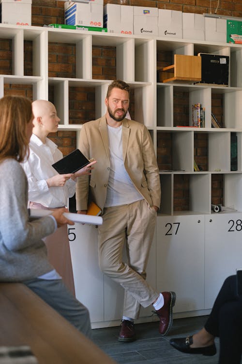 Free Colleagues discussing business strategy in office Stock Photo