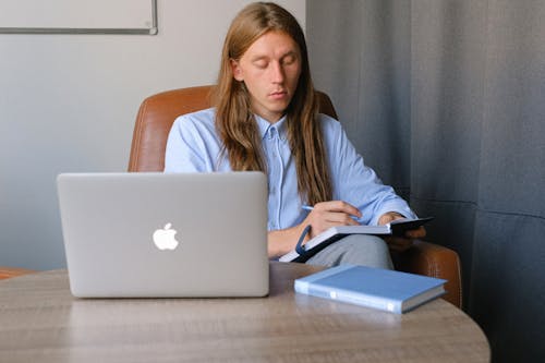 Concentrated man working in office