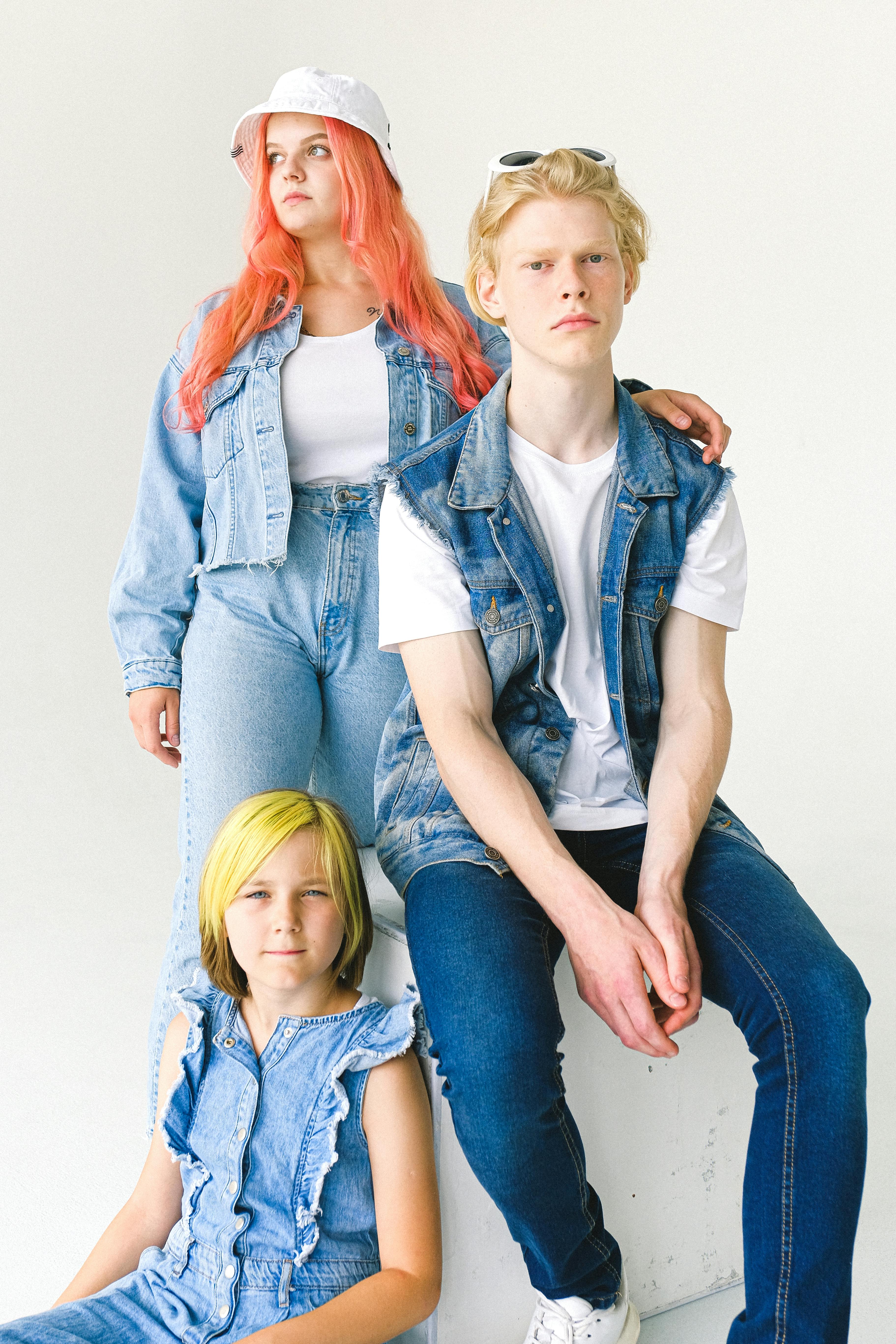 stylish girl and teenagers in denim outfits