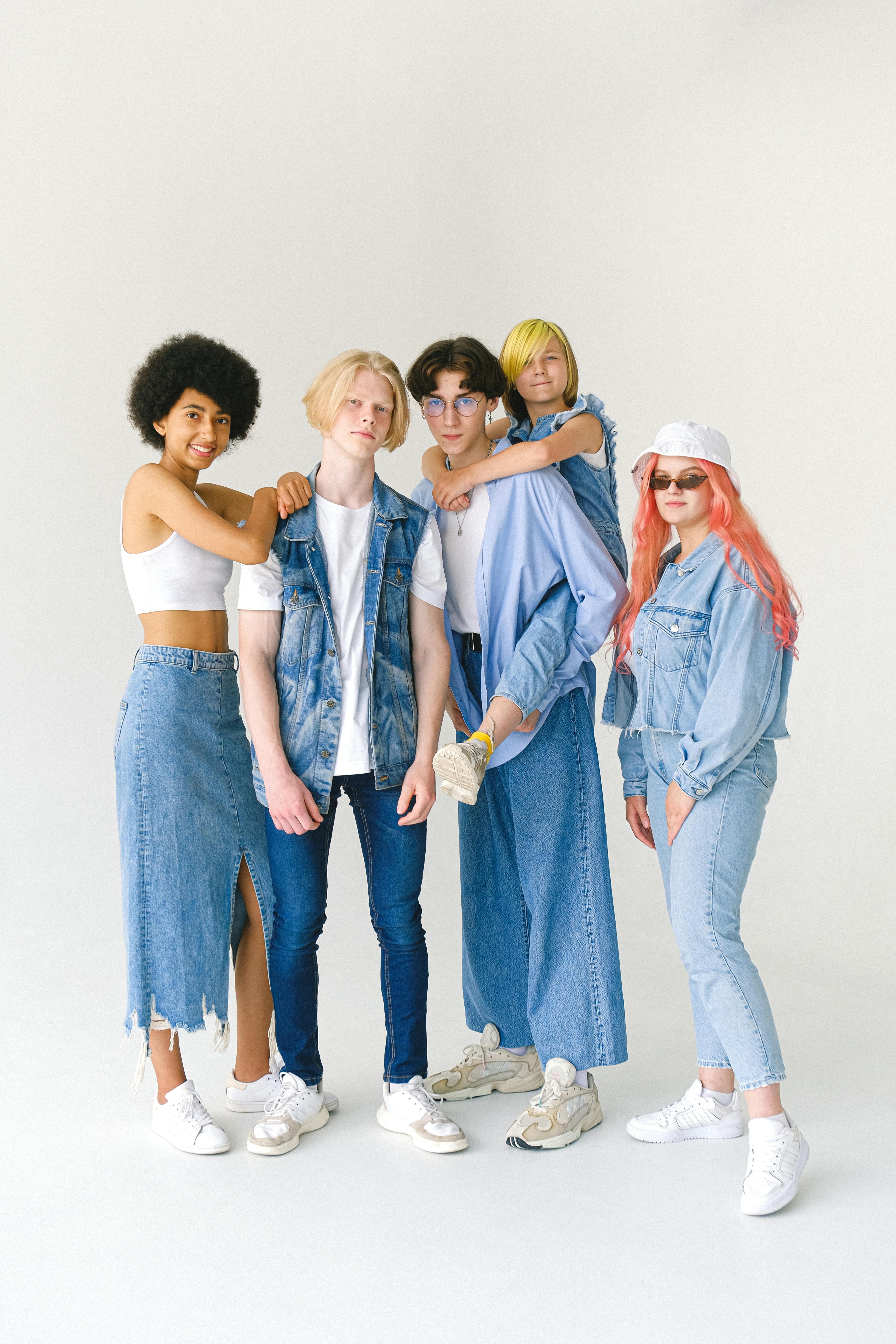 group of friends in denim outfits