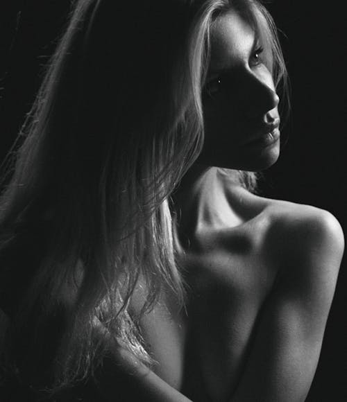 Topless Woman with Black Background
