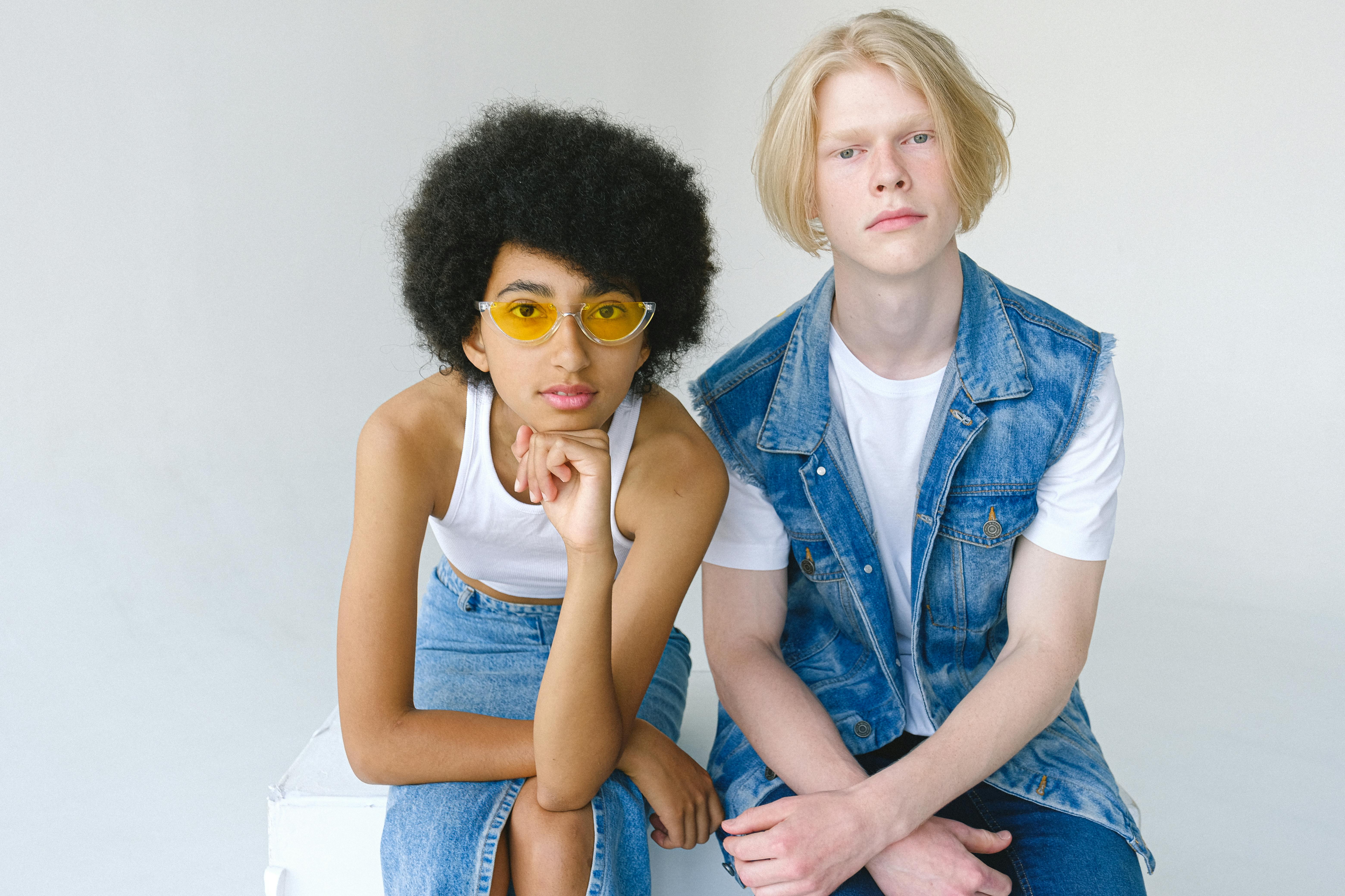 thoughtful diverse couple looking at camera