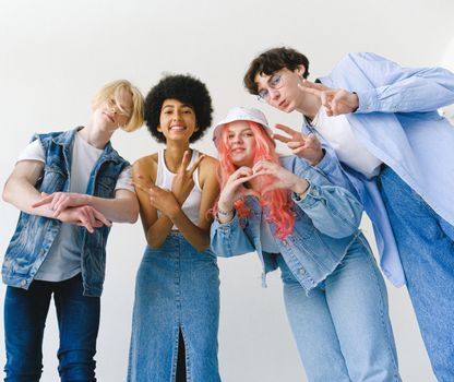 Models Wearing Denim Clothes Posing at The Camera