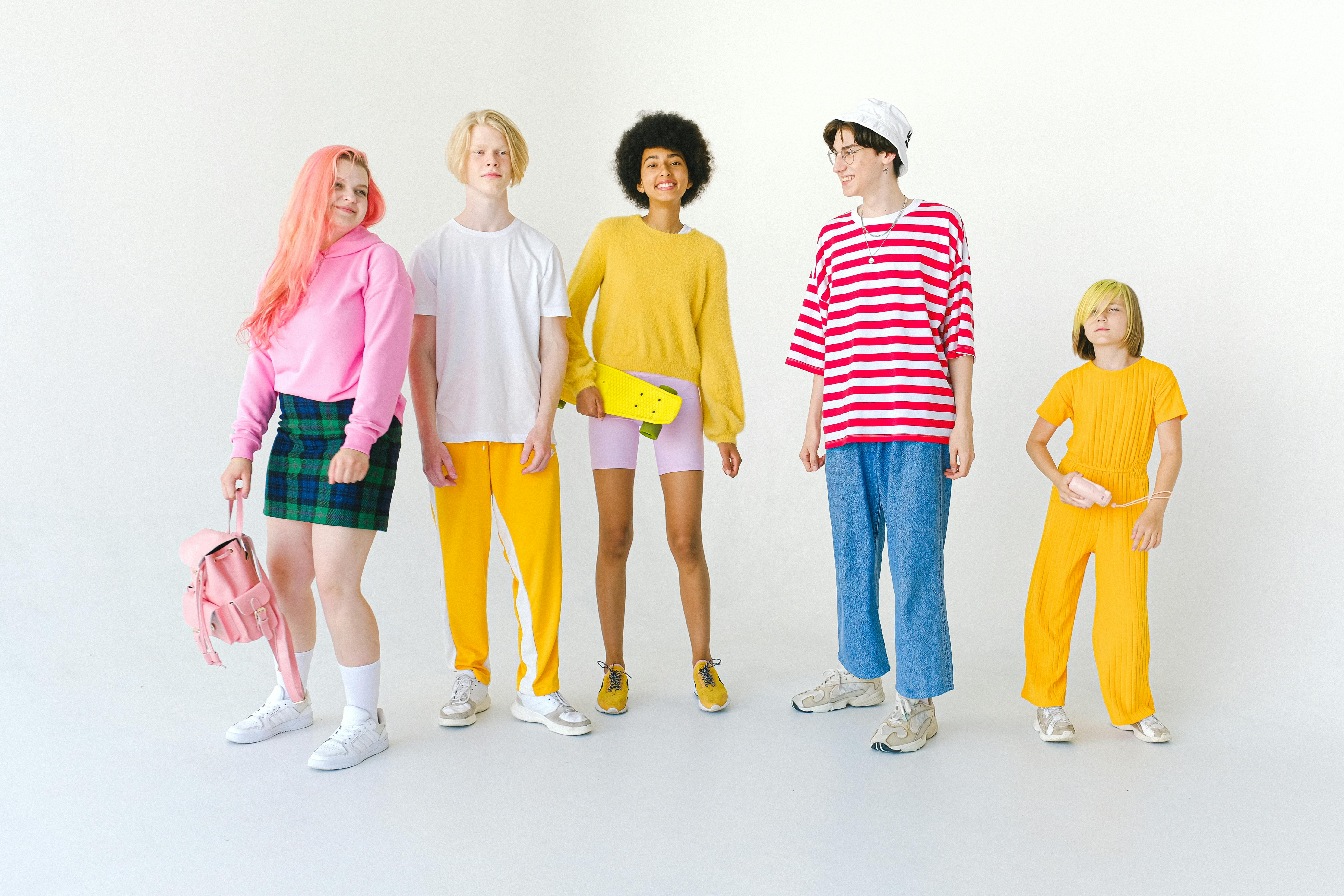 cheerful diverse friends in colorful wear