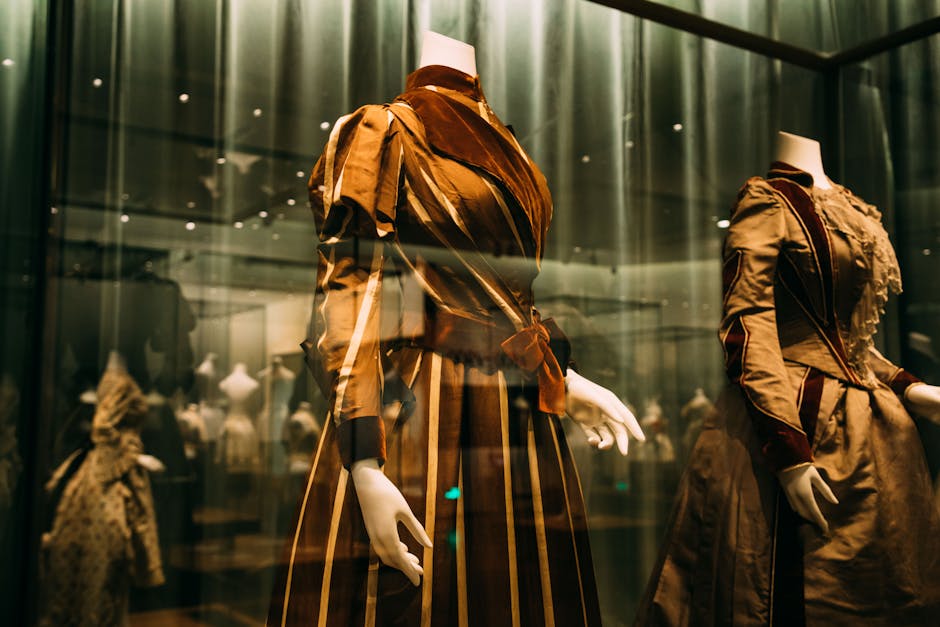Exhibition of assorted historical costumes in showcase